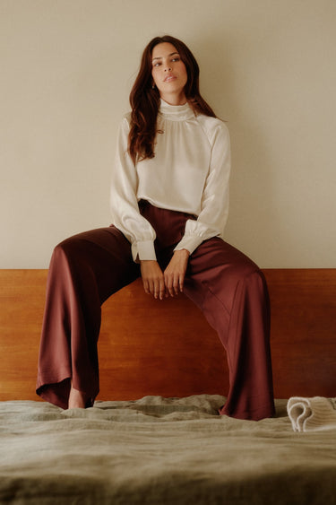 NADINE SLOUCHY SILK TURTLENECK TOP | GARDENIA