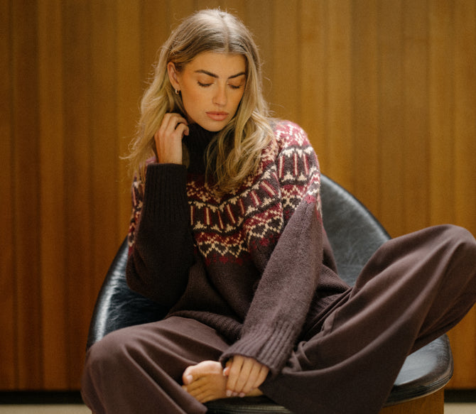 a woman sitting in a chair